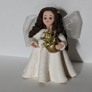Kneaded Angels Avon Figurine Holding Gold Stars